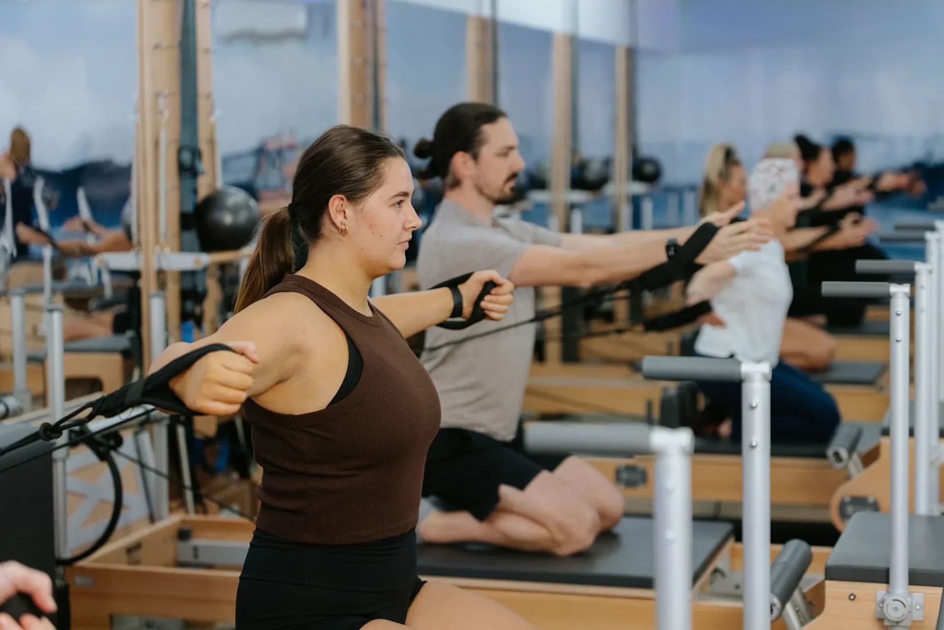 Club Pilates reformer class in session