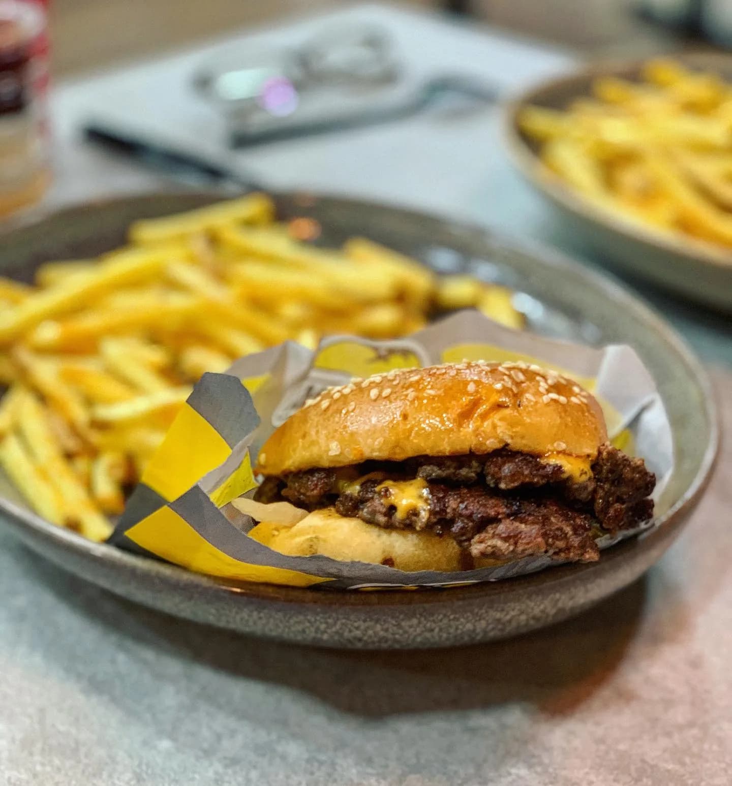 Arizona Joe's signature American-style halal burger with fries