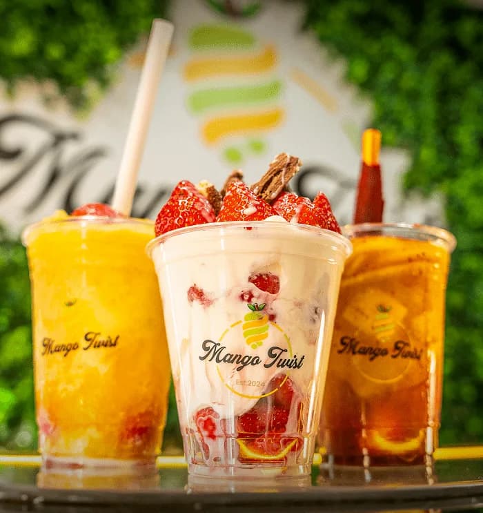 Mango Twist signature drinks range showing colourful tropical fruit creations