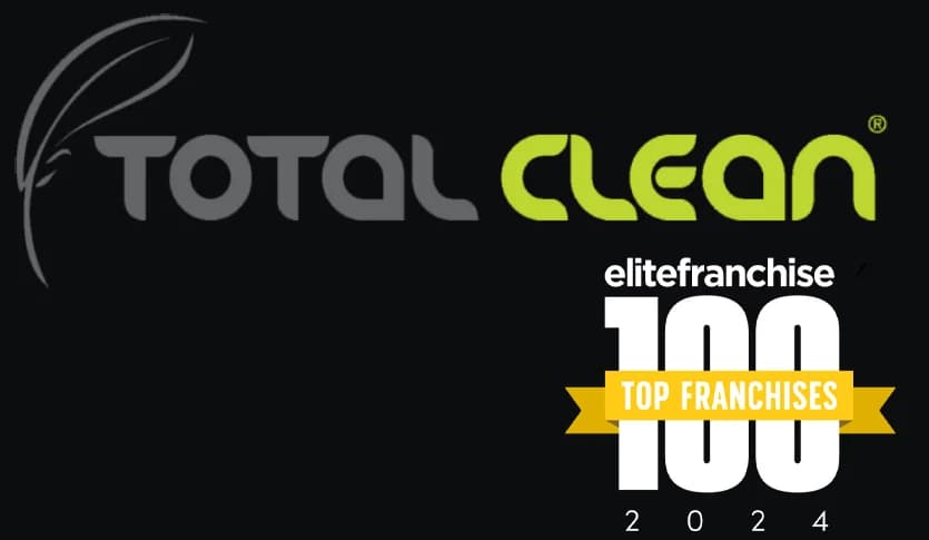 Total Clean brand graphic on a black background featuring the grey-and-green 'TOTAL CLEAN' logo with the 'elitefranchise 100 TOP FRANCHISES 2024' award badge in white and gold beside it