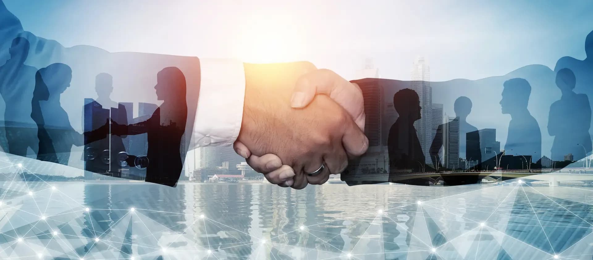 B2B franchises business partnership handshake with professionals and city background