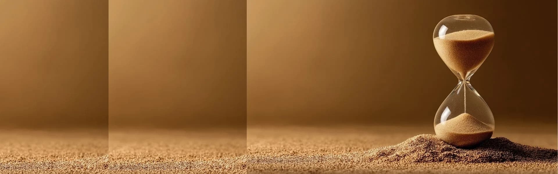 Hourglass with sand falling, sitting on a sandy surface against a warm brown background, representing part-time franchise opportunities in the UK.