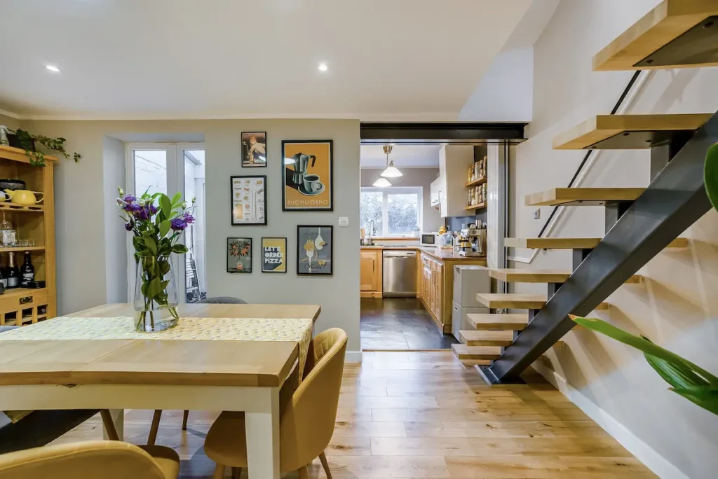 Modern renovated UK home interior with open kitchen and dining area by Refresh Renovations Franchise